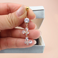 Xinfocus 2026 Nouvelle conception Anneaux de nombril en cristal Acier inoxydable Piercing de nombril Plaqué or Bijoux de corps pour femmes et hommes