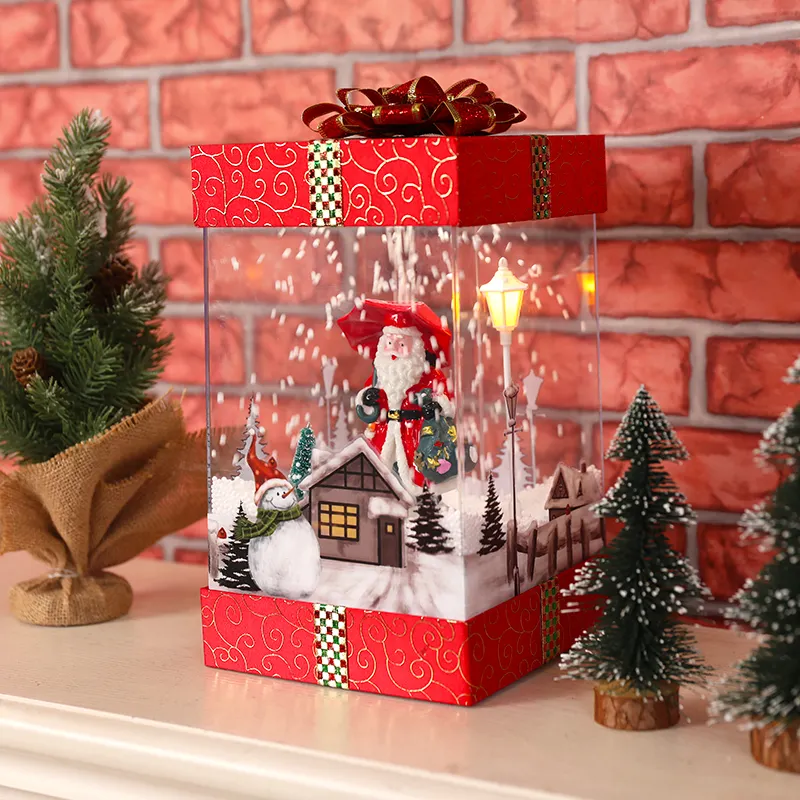 새로운 디자인 크리스마스 파티 장식 Adornos De Resina Hamper 떨어지는 눈과 음악 기능으로 크리스마스 선물 상자 빛