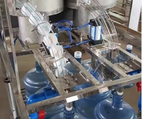Machine de remplissage d'eau pure électrique automatique 500 ml, haute productivité, moteur à économie d'énergie, PLC pour boissons, Dubaï
