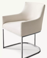 Fauteuil de salle à manger moderne à dossier haut incliné, enveloppé de lin crème, avec accoudoirs en forme de boîte et base cantilever en métal blanc poli