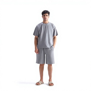 เสื้อยืดคอตตอนสีเทาทรงโอเวอร์ไซส์สำหรับผู้ชาย ชุดเสื้อยืดแขนสั้น คอกลม สีพื้น สวมใส่สบาย ระบายอากาศได้ดี ผลิตจากผ้าเจอร์ซีย์ - Product Image 1