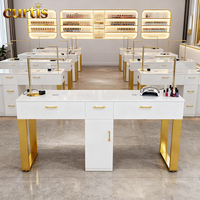 Ensemble de table de manucure de luxe moderne à trois places avec éclairage LED, plateau en marbre et dépoussiéreur intégré pour salon commercial