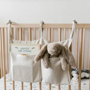 婴儿尿布球童和托儿所悬挂组织者悬挂尿布组织亚麻储物袋用于挂在婴儿床上的必需品