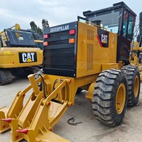 Niveleuse à moteur CAT 140K d'occasion, Caterpillar 140K 140H, niveleuse de construction routière avec peu d'heures de fonctionnement, à vendre