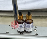 Machine de remplissage, de bouchage et d'étiquetage automatique pour flacons compte-gouttes en verre de 30 ml, 2 oz, 4 oz pour huiles essentielles et liquides - Prix