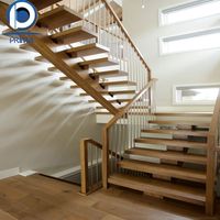 Escalier en colimaçon en bois massif sur mesure PRIMA, design flottant moderne pour villa intérieure