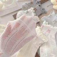 Chaussettes mi-mollet en dentelle blanche pour femme, respirantes, tricotées avec compression, pour usage quotidien au printemps, logo sur le bord et le corps