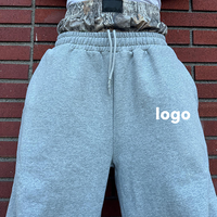 Ensemble de survêtement personnalisé en gros : sweat à capuche et pantalon évasé à double taille, coupe ample et oversize pour homme