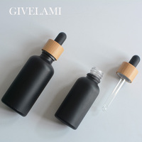 Grosir Botol Penitis Serum Minyak Hitam Matte, 5Ml 15Ml 30Ml 50Ml 100Ml dengan Tutup Kayu Bambu untuk Perawatan Kulit