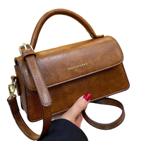 2025 Otoño Invierno nuevo bolso cruzado de moda para personas mayores con sensibilidad Retro solo hombro pequeño forro de poliéster de cuero cuadrado
