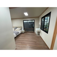 Villa Prefabricada de Acero de Lujo Expandible de 20 pies, 3 Recámaras, 2 Baños, con Diseño Moderno y Característica Impermeable