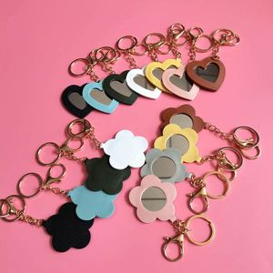 2024 New Wholesale Mini Makeup PU Mirror With <b>Key</b> <b>Chain</b> Private Label Cute Flower Heart Shape Mirrors - Product Image 6