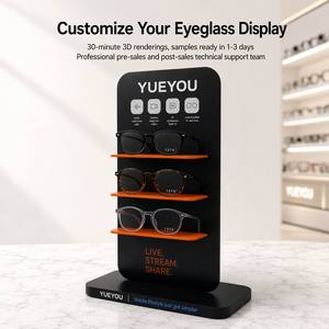 Espositore Verticale Nero a 3 Livelli per Occhiali con Dettagli <span class=keywords><strong>Arancioni</strong></span>, Scaffali Funzionali, Pannello Posteriore Iconico, Design Compatto per Bancone - Product Image 1