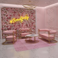 Chaise de salon rose clair à LED pour boutique de spa et salon de beauté Mobilier confortable pour salle d'attente des clients