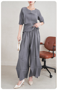 Pantalones Casuales de Mujer de Talla Grande con Diseño de Moda, Negros, Texturizados, con Parches, Plisados, de Pierna Ancha, Holgados y con Caída, Venta al por Mayor a Granel - Product Image 5