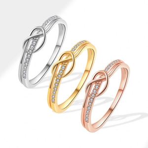 Anillo de eternidad único de doble capa con nudo para mujer, chapado en platino, para el dedo índice, con circonita, joyería de piedra de nacimiento de julio - Product Image 1