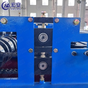 เครื่องขึ้นรูปลอนหลังคาเหล็กแบบซิงโครนัสขับเคลื่อนด้วยเซอร์โว พร้อมระบบควบคุม PLC กว้าง 1200 มม. ทำงานอัตโนมัติสำหรับใช้กับผนัง - Product Image 4