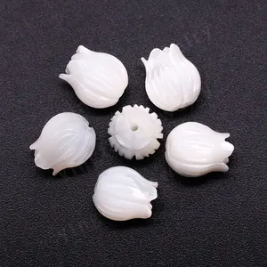 Großhandels preis Geschnitzte natürliche weiße Farbe Muschel Perlmutt Blumen perlen mit Löchern