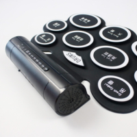 Vente en gros Batterie électronique portable Niveau professionnel Tambour à main enroulable Musique Batterie électronique avec haut-parleur
