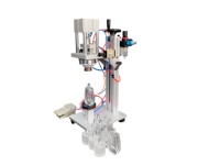 Machine à sertir pneumatique semi-automatique pour capsulage de bouteilles de parfum