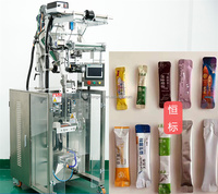 Machine d'emballage automatique de sachets en plastique à remplissage de haute précision contrôlée par PLC électrique pour les boissons et les produits chimiques