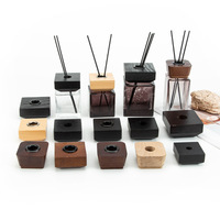 Bouteille en verre carrée de luxe de 100 ml pour diffuseur à bâtonnets, couleur noire personnalisable, avec bouchon à vis carré en bois sérigraphié et finition dépolie