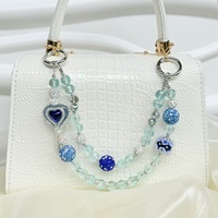 Nueva funda para teléfono con correa de pulsera de lentejuelas metálicas con efecto de diamante y cadena colgante