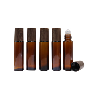 Rollo en botella transparente de ámbar esmerilado personalizado 3ml 5ml 10ml15ml30ml50ml con tapa de bambú falso para el cuidado de la piel Perfume de aceite esencial - Product Image 1