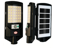 Lampu Jalan Tenaga Surya Terpadu All In One Sensor Gerak Manusia PIR Kontrol Jarak Jauh IP65 Tahan Air ABS 5000K Cahaya Siang untuk Luar Ruangan