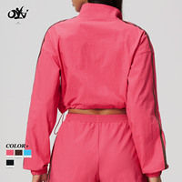 Veste de sport légère et respirante à col montant, style color-block, séchage rapide, coupe ample, décontractée, style crop-top, avec fermeture éclair, pour la gym