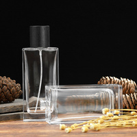 Flacon de parfum élégant en verre transparent de 100 ml, forme carrée, logo personnalisable, qualité supérieure, flacon vide pour emballage cadeau