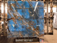 Revêtement mural extérieur décoratif de luxe dalles livre assorti bleu onyx marbre pour villa