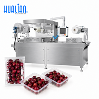 Machine de thermoformage et d'emballage sous vide automatique Hualian HVR-320A(Q) pour cerises et fruits frais
