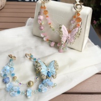 Cadena para teléfono móvil con diseño de mariposa, doble cadena, hecha a mano con cuentas, joyería de alta gama, colgante de borla de perlas, venta caliente transfronteriza