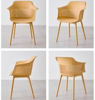 Chaise de bistrot contemporaine en plastique perforé à l'aspect maillé, sans accoudoirs, pour cantine, café, restaurant