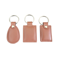 Porte-clés intelligent en cuir PU de luxe, anti-RFID, 125KHz 13.56MHz, avec puce TK4100 F08, pour accès aux portes, vente en gros, directement de l'usine