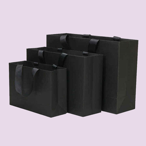 Custom Logo Kraft <b>Paper</b> Gift Bags Shopping Tote Bags Clothing Bags Wholesale In Stock Threaded Embedded Rope Handle - Product Image 1