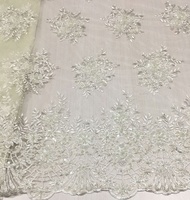 Nouveau tissu en tulle brodé avec des perles à la main, des paillettes et de la dentelle brodée pour les robes de mariée