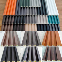 Revêtement décoratif en PVC composite Revêtement mural décoratif en stratifié de bois écologique de couleur noyer Revêtement mural décoratif Wpc