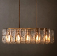 Lustre rectangulaire de luxe en verre transparent épais avec finition dorée, idéal pour hôtel, salle à manger, salon, restaurant