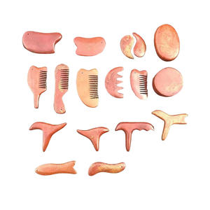 Collier de grattoir pour oiseaux rouges Surabaya naturel Peigne de massage en pierre triangulaire pour le visage Application du corps Masque pour les yeux - Product Image 1