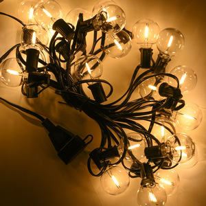 Guirlande lumineuse solaire à détecteur de mouvement G40 de 25 pieds et 50 pieds, en verre incassable, avec coque en cuivre, étanche IP65, pour l'extérieur et Noël - Product Image 1
