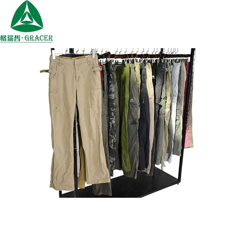 Almacén de ropa de segunda mano de China ropa por KG pacas usada Vintage ropa en línea