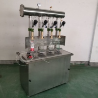 Machine de remplissage semi-automatique à 4 têtes pour boissons gazeuses, vin mousseux, bière, eau gazeuse, liquides, avec mélangeur