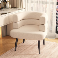Fauteuil rembourré moderne nordique avec dossier incurvé pour salon et hôtel