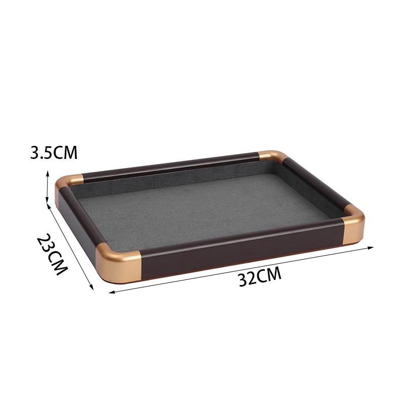 Golden rounded empty tray with gray lining