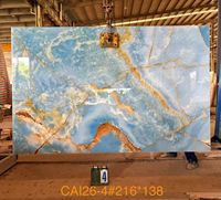Dalle de marbre onyx bleu rétroéclairée translucide pour mur de fond et comptoir de luxe