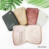 Portefeuille de voyage en cuir PU avec fermeture éclair, grande capacité, pour billets d'avion, cartes et passeports, impression de logo, imperméable et durable