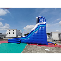 Château gonflable commercial de 23 pieds avec toboggan aquatique double piste