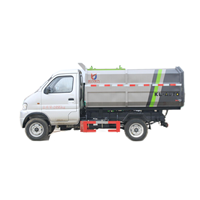 Mini camion à ordures compacteur diesel à chargement latéral avec crochet latéral, boîte de vitesses manuelle, transmission 4x2, pompe pour bacs de 120L/240L